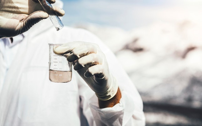 Scientist Taking Water Sample